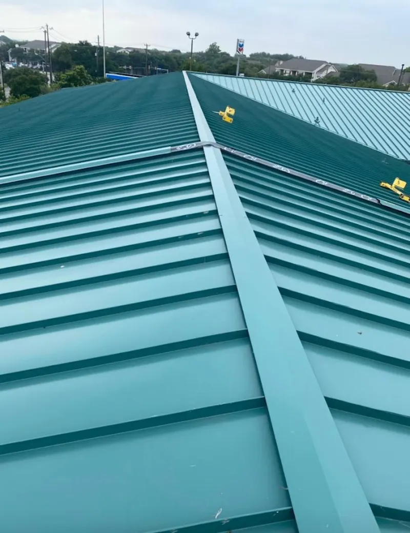 Green commercial metal roof ridge and valley for Metal Roof Repair in Scio
