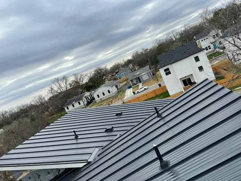 Standing seam metal roof panels with vents for Skylight Repair in Scio